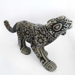Jaguar caminado de arte huichol