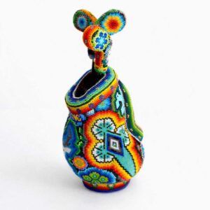 Bolsa con palos de golf en arte huichol