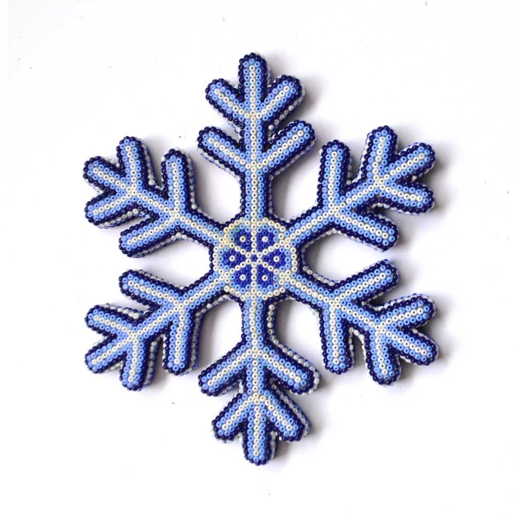 Copo de nieve con arte huichol