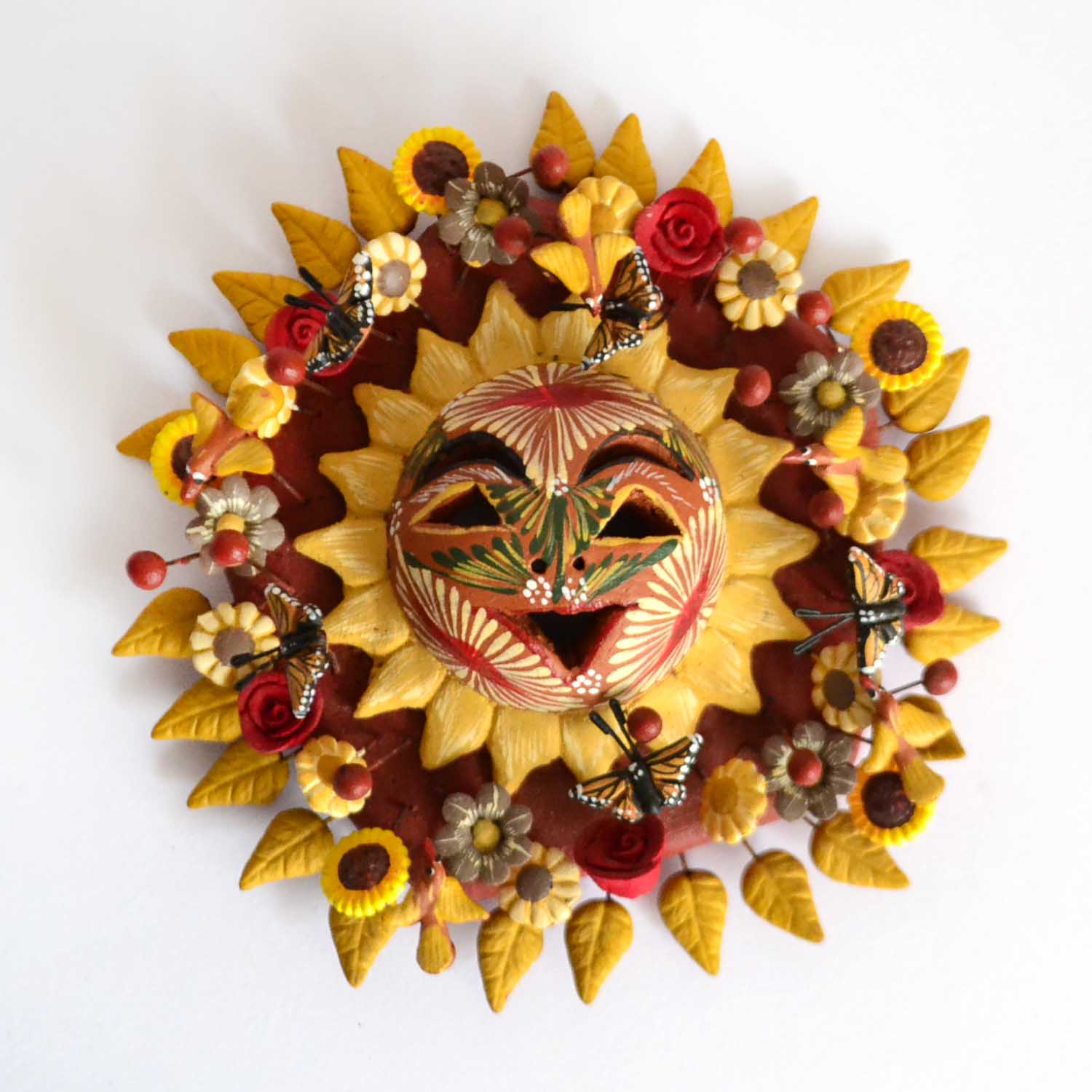 Polychrome clay sun