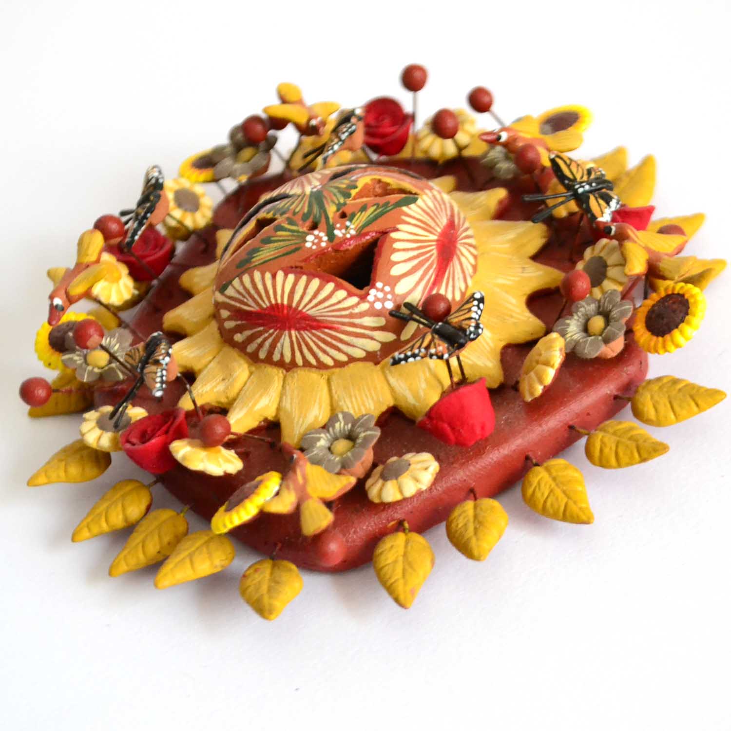 Polychrome clay sun
