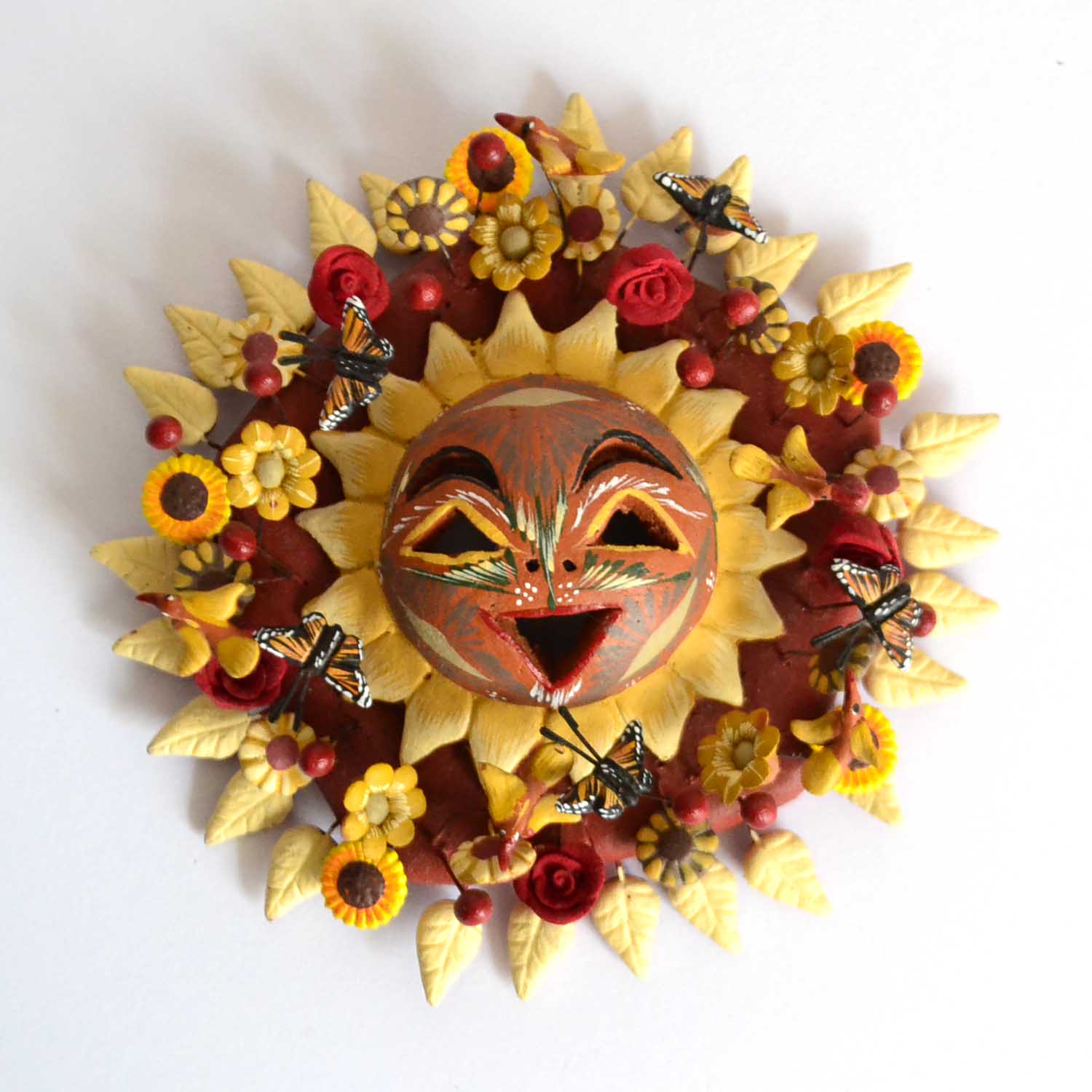 Polychrome clay sun