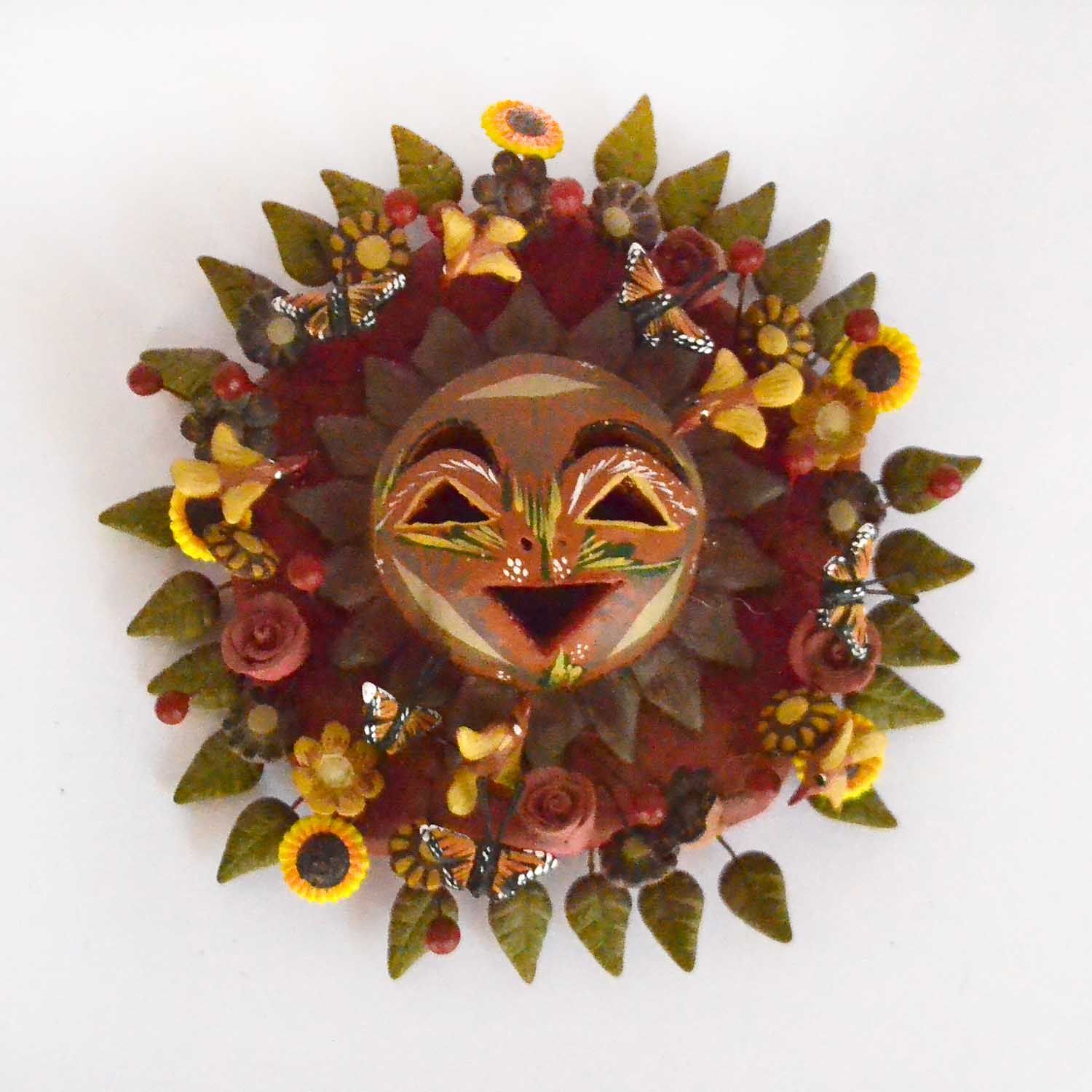 Polychrome clay sun